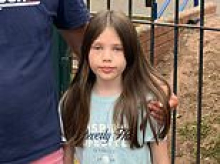 Schoolgirl, 10, dodged crash that killed pupil and injured 21 when she wasn't allowed to board full coach - as off-duty firefighter who saved youngsters is hailed a hero