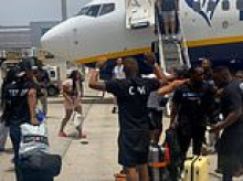 Moment fists fly as British stag do erupts into brawl just after landing at Tenerife airport following onboard row