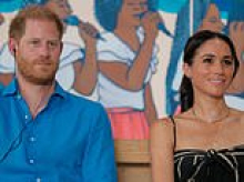 Glaring signs Harry is the 'Spare' in his marriage revealed by expert: How the words he whispered in Meghan's ear during public event let slip his real role