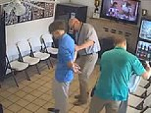 Chilling moment suspect in Devil's Den double murder gets arrested while having his hair cut at beauty salon