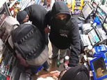 Lawless Britain: Knife-wielding robbery gangs threaten innocent shop keepers in TWO terrifying attacks