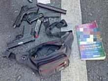 Fugitive Brit 'wanted by Spanish police for murder' is arrested in the Costa del Sol after car crash led to discovery of guns, ammo... and book on Buddhism