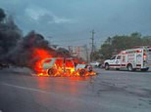 Dystopian moment prosecutor is murdered after his Cadillac Escalade was blown up at intersection in broad daylight