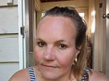 Horror after 'pioneering' house painter is found dead in her home in 'quiet' suburb - as her partner is arrested