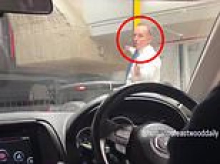 Drivers left absolutely stunned after spotting a high profile Aussie directing traffic in a busy carpark: 'Oh my god is that him?'