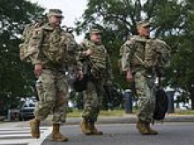 National Guard descends on streets of Washington DC after Trump vows to 'rescue capital from bloodshed'