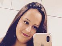 Alleged house of horror double killer smirks and winks in court - after he's accused of murdering mum-to-be and decapitating her partner before putting his head on a spike