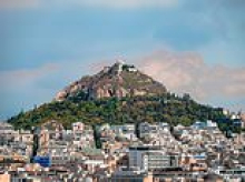 Tourist 'taking a selfie' plunges from church at the top of Mount Lycabettus - the highest point in Athens - after 'being swept by high winds'