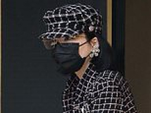 Mysterious wealthy heiress breaks cover in a SUPER expensive Chanel outfit to grab some cash - as she swaps her wrecked $1.5million Tiffany blue Rolls-Royce for a humble minivan after head-on crash