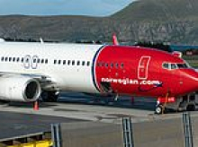 Boeing 737 carrying 181 passengers makes emergency landing after tyre explodes on take-off in Sweden
