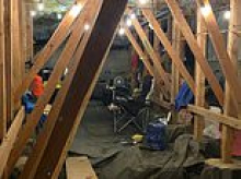 Condo owner who heard 'strange' noises in the walls discovers man living inside a crawl space