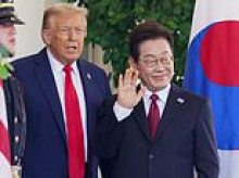 South Korea responds to raid of Hyundai plant that resulted in hundreds of arrests as new images show workers in chains