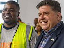 Woke Illinois gov. posed with 'violence disruptor' who days later 'killed young dad-to-be while fleeing Louis Vuitton robbery'