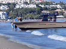 Sun, sea and smugglers: The scourge of narco gangs delivering drug shipments on Spain's tourist beaches in full view of holidaying families