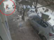 Terrifying moment two women narrowly escape death after balcony suddenly collapses
