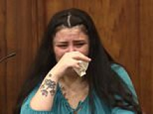 Woman who got pregnant while in jail sobs as trial is shown video of her shooting her husband dead