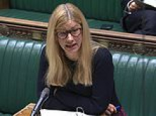 QUENTIN LETTS: A mulish cast of eye. A pout. Cheesed-off Ellie glowers at China grilling