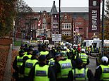 Ring of steel at Villa Park: Hundreds of police officers brace for violence as Israeli Maccabi football team arrive in Birmingham after masked Muslim thugs pinned 'Zionists not welcome' posters across the city