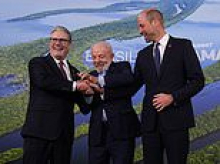 Awkward moment Prince William and Sir Keir Starmer appear to fumble handshake alongside Brazil's president at green summit