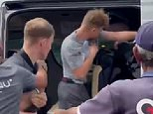 Moment Brit punches Middle Eastern man who 'put his bare feet on his headrest during bus tour and lashed out when asked to take them down'