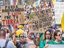 Holidaymakers are afraid of visiting parts of Spain because they fear being 'shot with a water-pistol' by anti-tourism fanatics, travel agent boss reveals