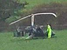 Moment gyrocopter falls out of sky as witnesses say they heard engine cut out before it crashed in field