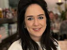 Female Blackrock lawyer who admitted kicking a passenger after a drink-fuelled homophobic rant on a train is spared jail