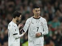 Cristiano Ronaldo sees RED: Portugal star is sent off for ELBOWING Ireland opponent before giving sarcastic response to decision - and he could miss country's World Cup opener