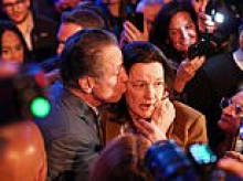 Truth behind photo of Andrew Cuomo grabbing and kissing female lawyer that drew vulgar sneers