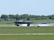 Missouri trailer park that shares a fence with US nuclear bomber fleet is owned by couple with ties to former Chinese Communist Party intelligence agent