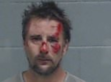 Cowardly father tries to flee police by jumping out of his moving car with his wife and children still inside