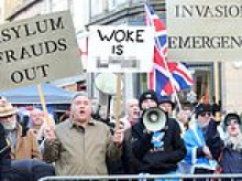 It's war! Hundreds take to the streets in protest over Starmer's plan to house 300 asylum seekers at Scottish barracks