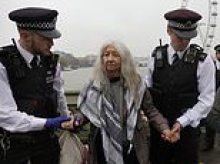 Police arrest five after Palestine Action banner is hung from Westminster Bridge as pro-Gaza supporters pledge week of mass action