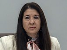 Former Federal Reserve governor blames her husband after she's found to have repeatedly violated trading rules