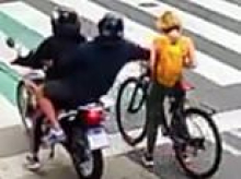 Extraordinary moment phone thief gets instant karma as he's tackled to the floor by brave woman