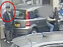 Moment thugs steal £3,000 from the boot of elderly man's car as cops hunt suspects