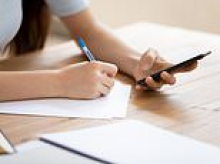 Father called the police when school in London stopped letting children bring in mobile phones - but headteacher wants a nationwide ban and says primary-aged pupils are addicted to porn