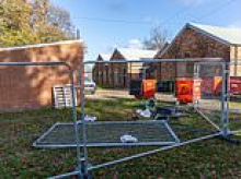 Workers begin converting army barracks into camp that will house 600 male migrants on edge of town