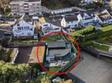 Sandbanks businessman accused of turning millionaires' playground into a 'mini Manhattan' with plans to 'shoe-horn' £700k property onto plot of land