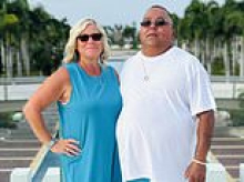 Married couple is found murdered inside their waterfront home after chilling 911 call - as police arrest friend