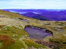 Two young female hikers are winched to safety after they were left stranded on a mountain overnight in severe weather