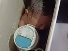 Newborn baby is found alive stuffed in a toilet cistern: Miracle rescue after cleaner hears tiny girl's cries in Thai office block