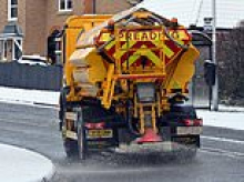 Go out and grit your own roads, taxpayers told: Homeowners given salt, hi-vis jackets, gloves and shovels to save councils coffers (after they raised tax by 5 per cent)