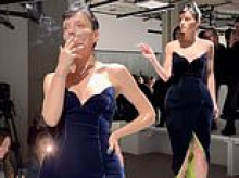 Lily Allen is branded 'an icon' as she struts down the catwalk smoking a cigarette in a 'Diana revenge dress' for the 16Arlington London show