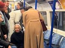 Hunt for 'knifeman' who 'ran towards terrified Tube passengers with a huge machete' before fleeing the station