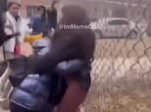 Pregnant mother and her son, 9, are beaten to a pulp and thrown to the ground by gang outside school in Chicago