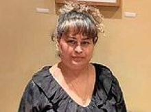 Mother, 50, was told to get rid of her two XL Bully dogs before her twin sons found her mauled to death at home, inquest hears