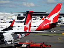 Chaos on Qantas plane mid-flight as a 'disruptive' passenger is restrained and removed