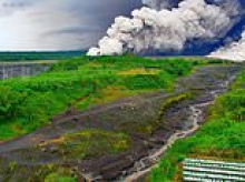 Indonesian volcano erupts spewing enormous 54,000ft ash cloud as people run to safety and Australia issues flight safety warning