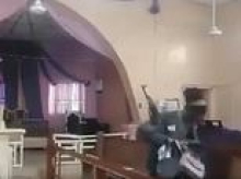 Gunmen storm Nigerian church, killing two people - as Christian group insists genocide IS underway